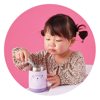 little girl using insulated food jar mini